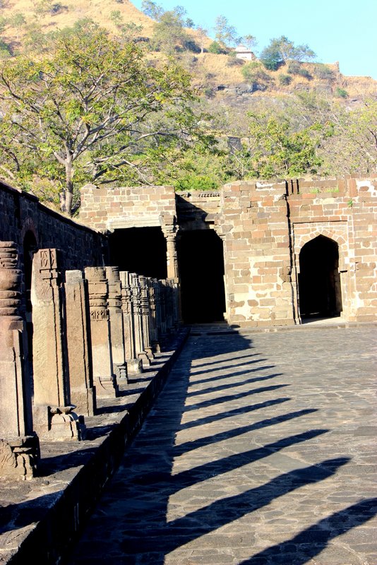The Bharat Mata Temple appears to be 'built' on the site of a mosque, or rather has been converted into a temple. The mosque, in turn, appears to have been built from the remains of an earlier temple as a detailed which in turn is built on the site of an earlier temple. It is quite strange to see